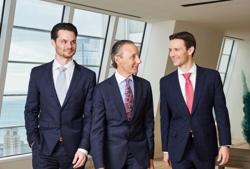 Brian L. Salvi and Patrick A. Salvi II surround their father, Patrick A. Salvi, Sr.