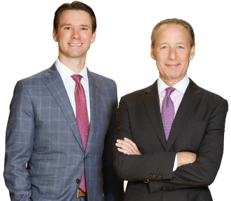 Experienced birth injury lawyers in professional suits, standing confidently and ready to advocate for families affected by medical negligence.
